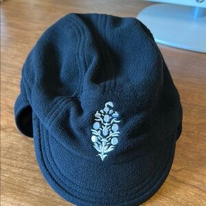 Free People Movement Butti Earflap Black Fleece Cap with Embroidered Design NWT